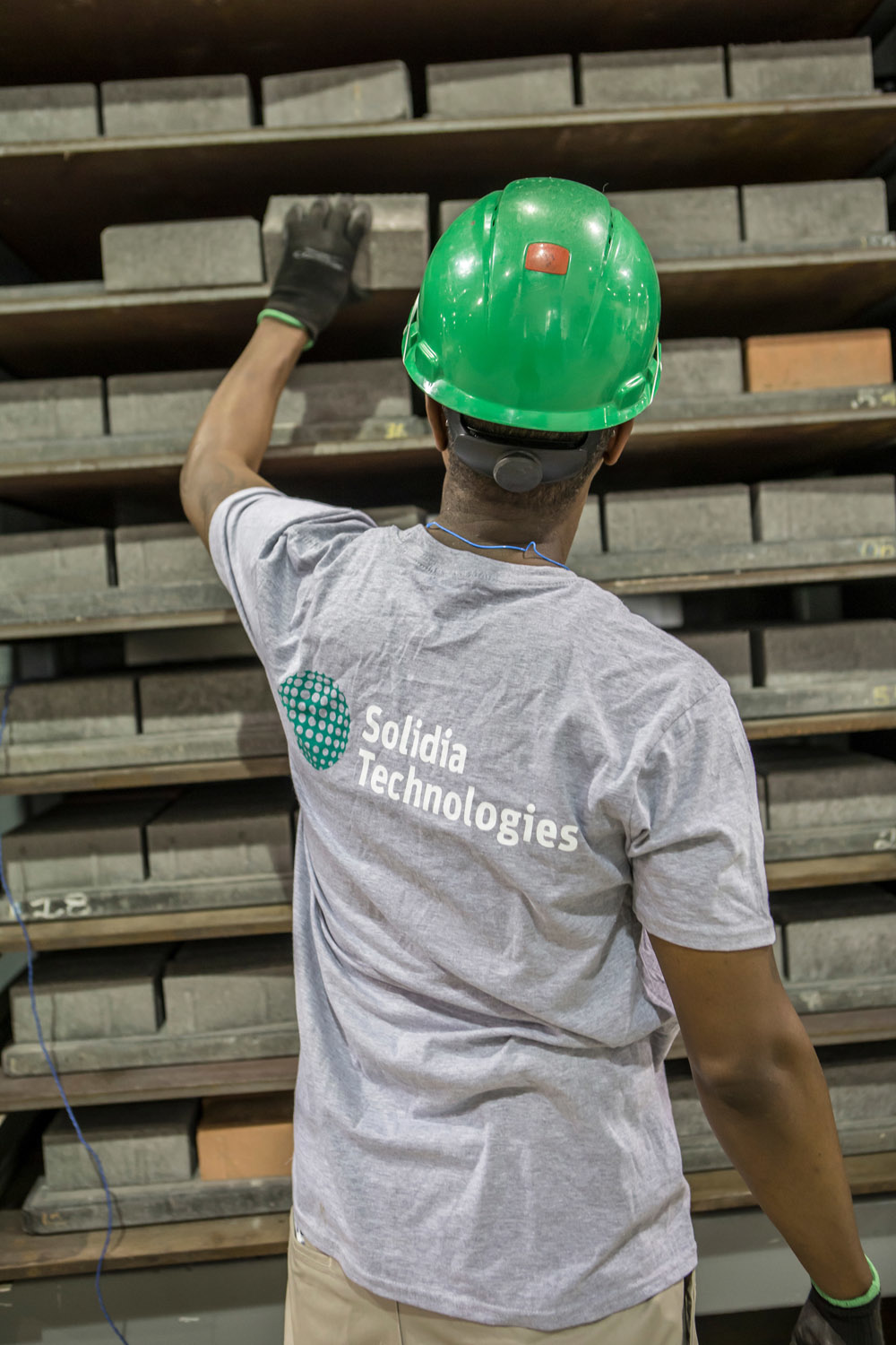 Solida concrete pavers being loaded into the CO2 curing chamber.