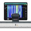 The Proceq GP8100 ground-penetrating radar device (foreground) and results on iPad.