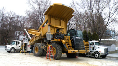 The large tires found on off-highway haul trucks are not cheap to repair or replace after damage occurs. Adding a tailgate can reduce that expense and downtime.