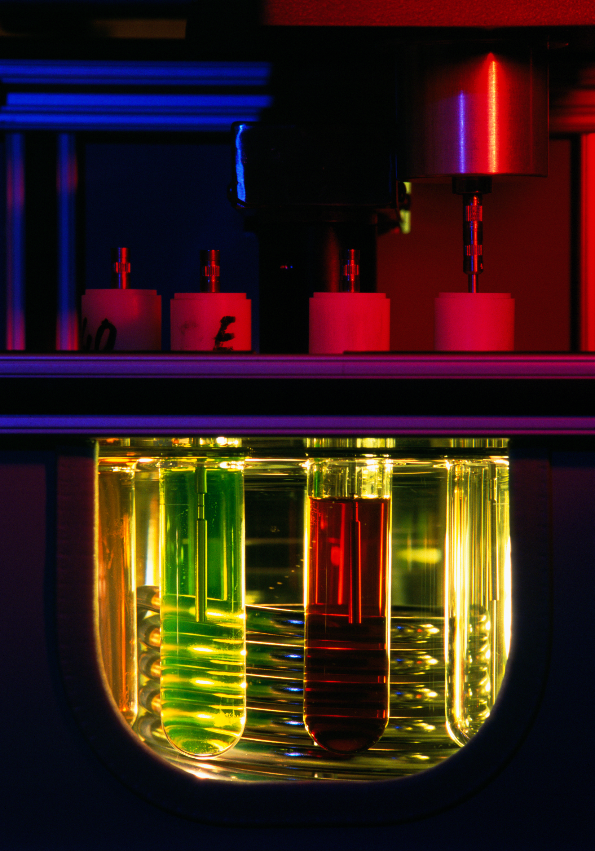 Oil viscosity is being tested in a lubricant lab.