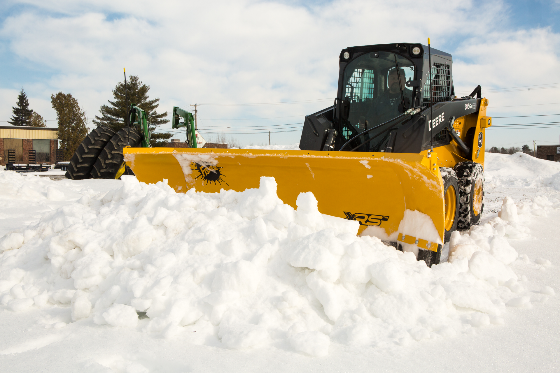 Fisher® Xrs™ Skid Steer Plow