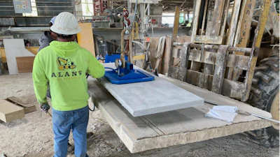 Silverdale Quality Stone coupled a Vacuworx PHD vertical lift mounting assembly with a Caterpillar 262D skid steer loader, using the system to maneuver 1,500-lb limestone slabs in the vertical position
