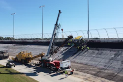 On these 28° banks, segregation is controlled with the feeder belt that fed the paver, a proprietary piece Sunmount developed to pave the high banks.