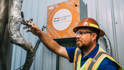 Thomas Concrete has invested in carbon utilization technology from CarbonCure Technologies - improving the concrete's strength. Justin Lazenby Technical Services Manager at Thomas Concrete Inc. at the company's CarbonCure valve box.