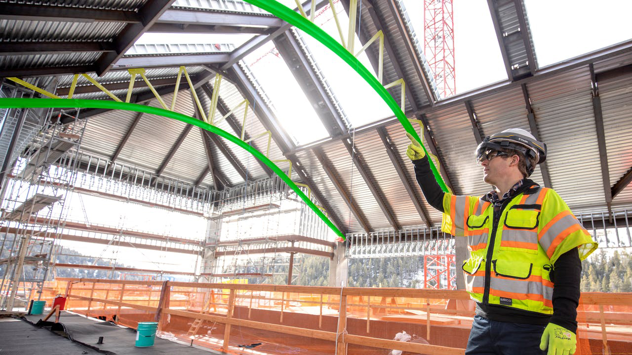 The Trimble XR10 with Microsoft HoloLens connects virtual reality to physical reality to provide mixed reality.