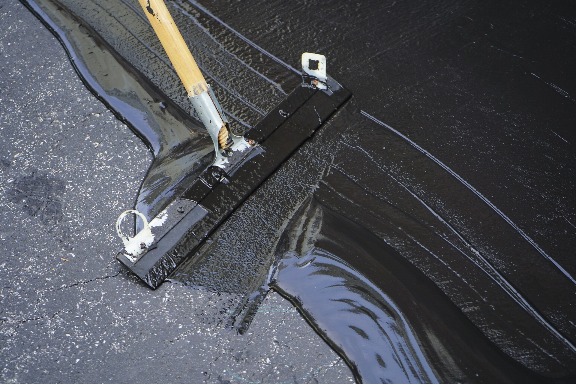 An 18-year-old saw a display for seal coating that inspired him to launch a multi-location asphalt paving enterprise.