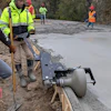 Battery-powered curbing machines are often used for monolithic pours but can also be used for patch and repair work and can complement slipform pavers for corners and tight radii involved with larger jobs.