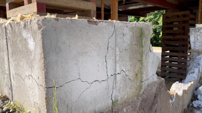 The defective concrete typically develops hairline cracks 15 to 20 years after being poured, then rapidly expands over the next several years.