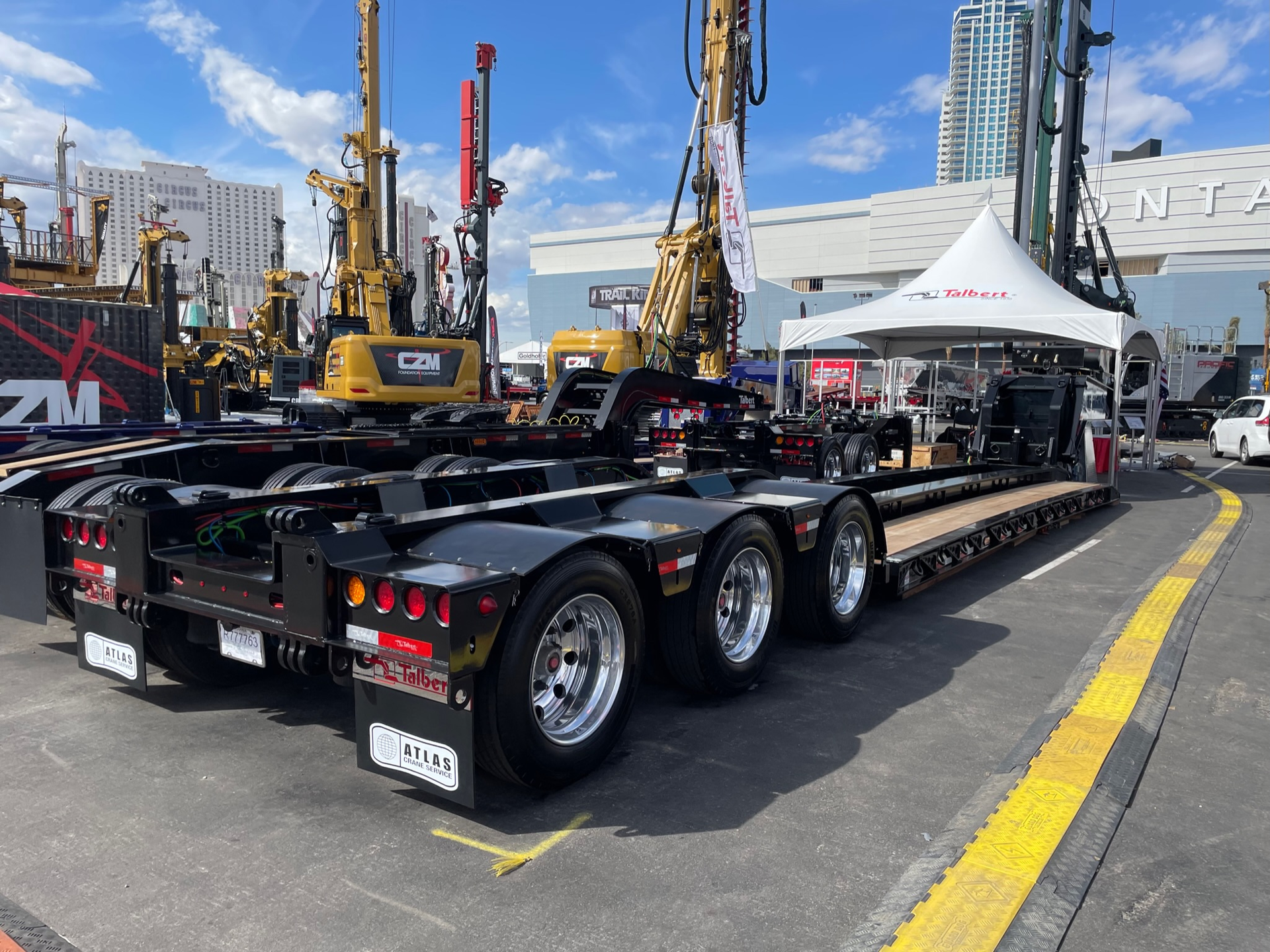 The custom trailer maintains a 70-ton rating at half the deck length and offers 6-in. loaded road clearance.