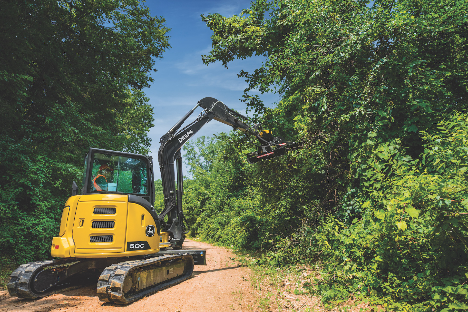 John Deere Construction & Forestry provides brush cutters like the RE50, which is ideal for embankment and ditch management, over-fence brush management and rail right-of-way maintenance.