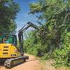 John Deere Construction & Forestry provides brush cutters like the RE50, which is ideal for embankment and ditch management, over-fence brush management and rail right-of-way maintenance.
