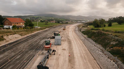 Road base is typically introduced after the subgrade has been prepared and compacted to a stable and level surface.