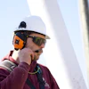 This helmet mount features tactile buttons for navigation and optional dual battery usage.