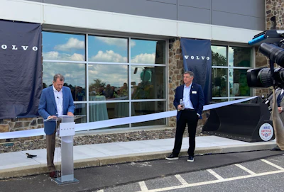 Watters speaks during the ribbon cutting