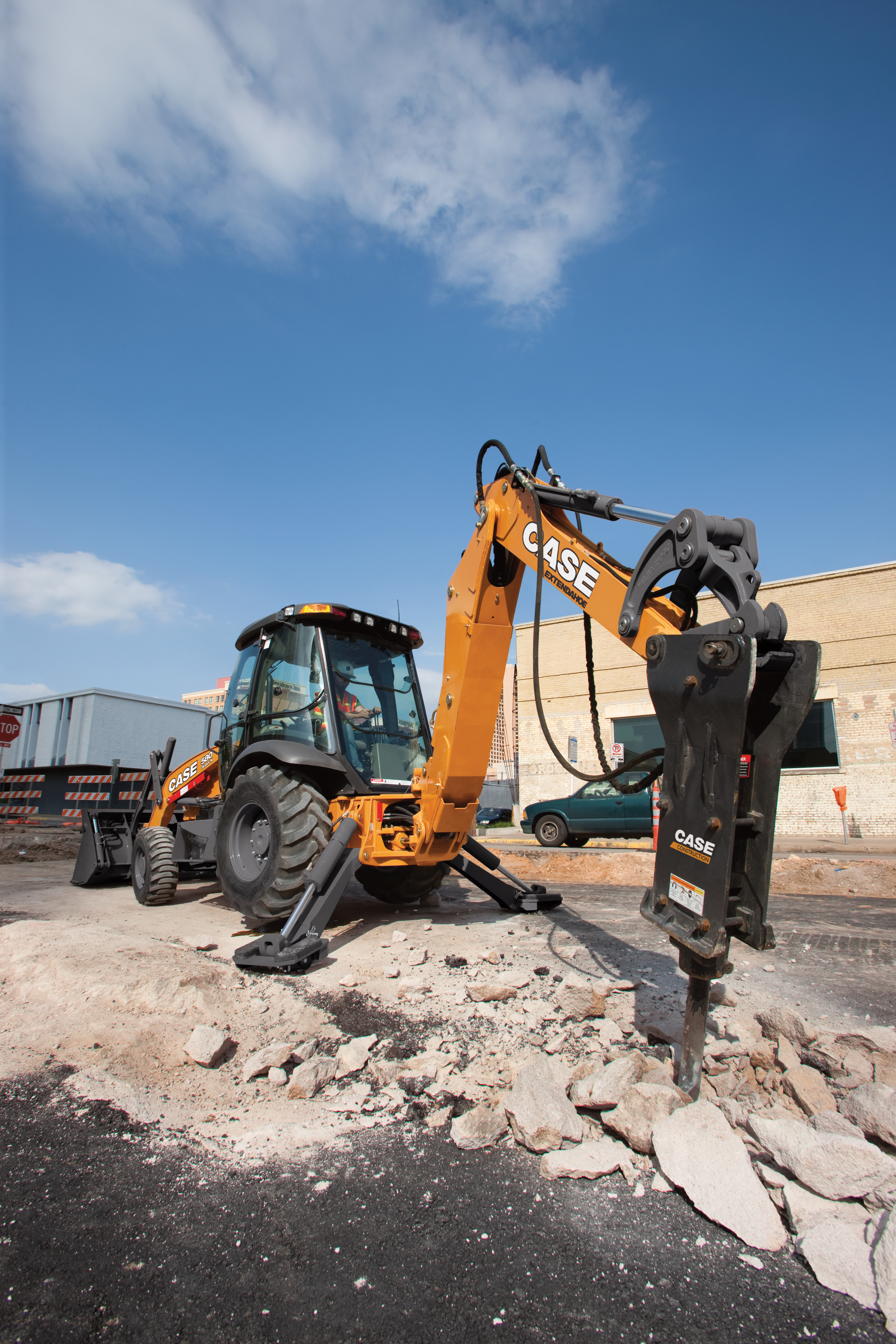 Backhoes can be used to do everything from laying pipe to digging trenches and can even break up concrete or asphalt with a hydraulic hammer attachment.