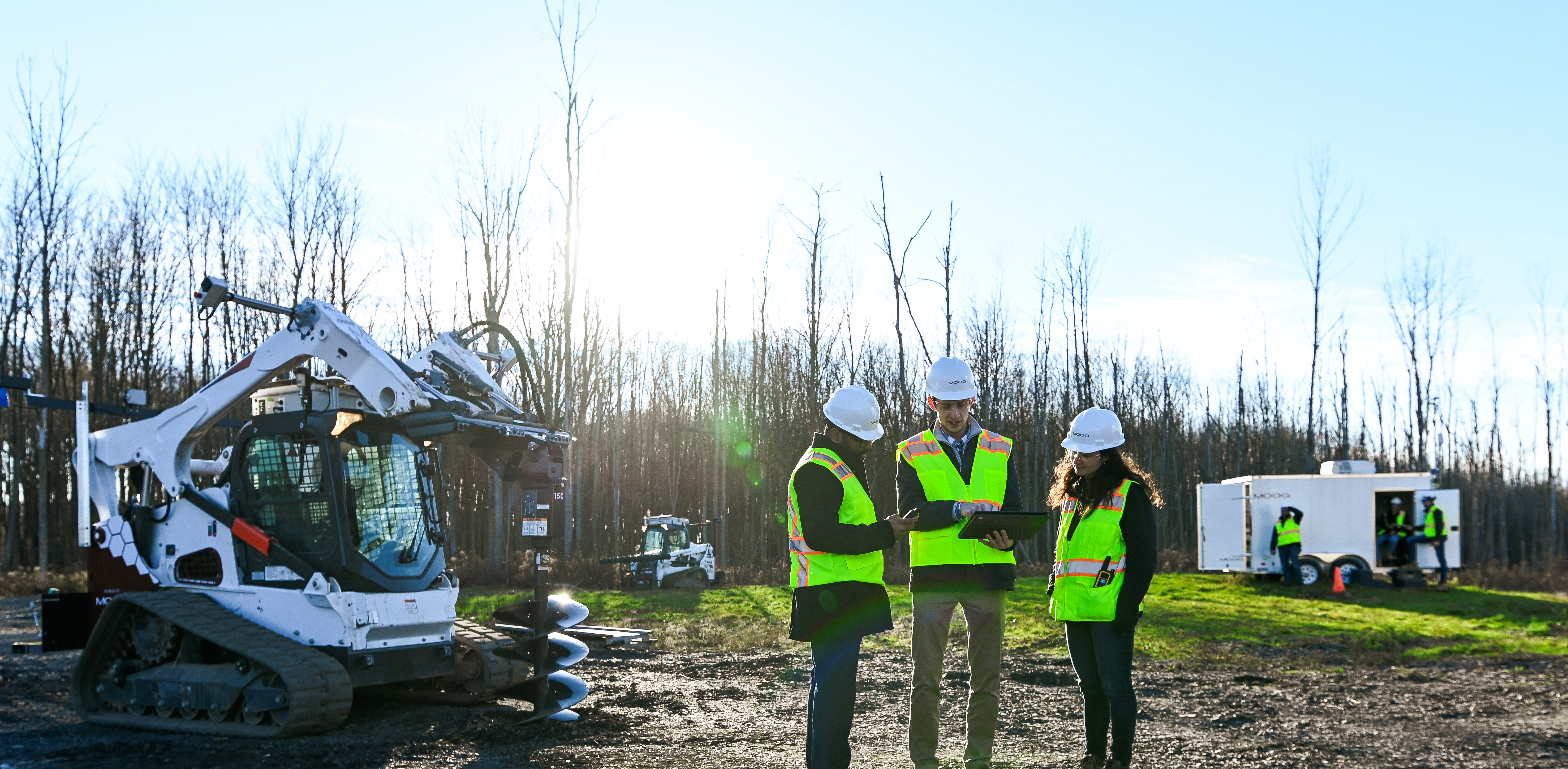 Moog Construction engineers at a dig site test some automated capabilities and machine control on various compact construction vehicles.
