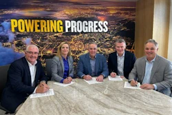 Executives from CRH sign the agreement with Caterpillar Group President Denise Johnson at the company’s headquarters in Irving, Texas.