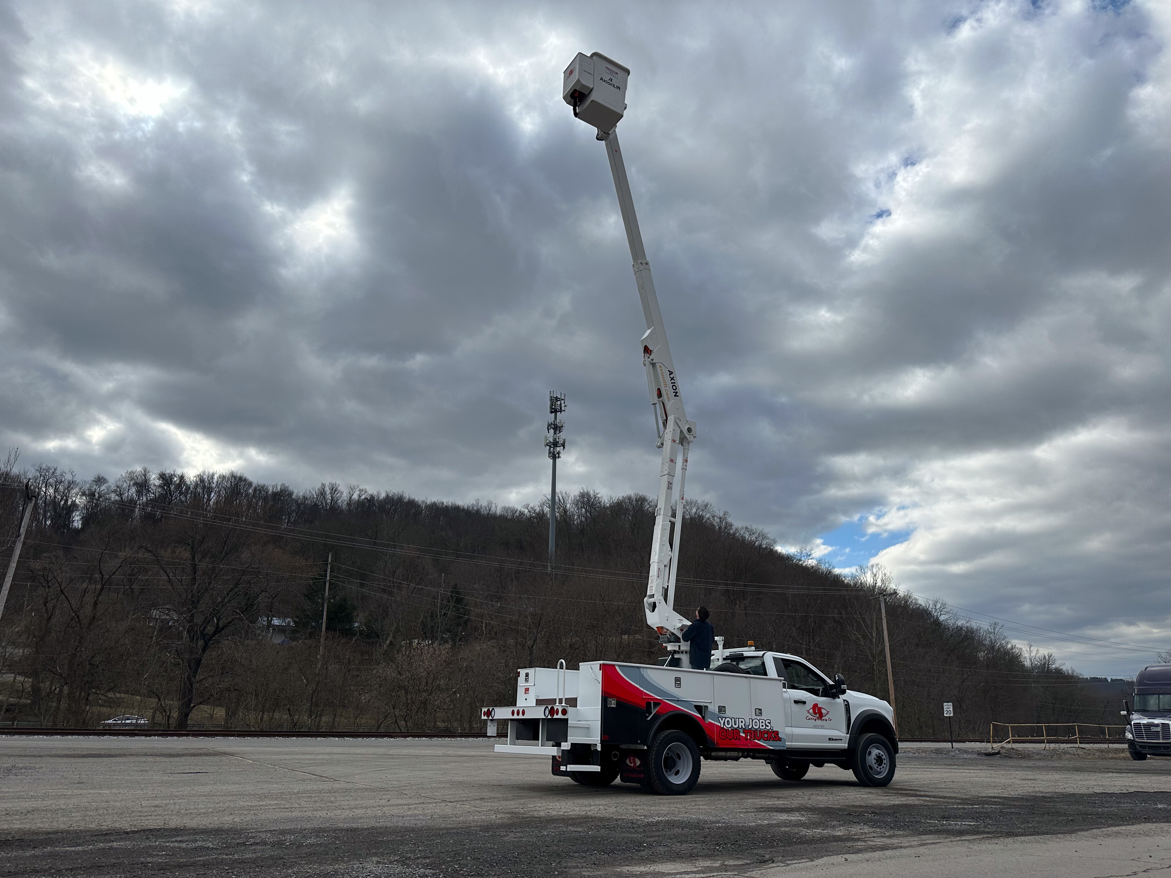 The new Curry Supply Aerial Truck features the AxionLift model AT4313i with insulated arial device and a 44.3-ft. working height, mounted to a custom Dakota Utility Line Body.