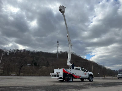 The new Curry Supply Aerial Truck features the AxionLift model AT4313i with insulated arial device and a 44.3-ft. working height, mounted to a custom Dakota Utility Line Body.