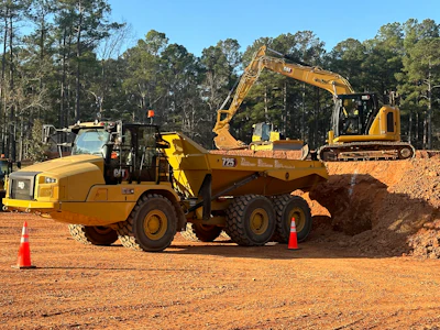 One of the skills competitions focused on small hydraulic excavator maneuvers.