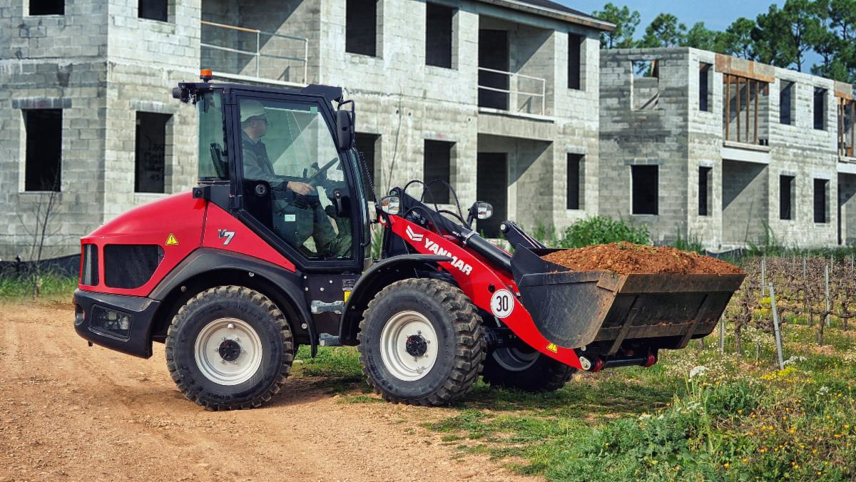 As part of the company's shift in market approach, execs explain the strategy behind the brand's 2020 departure from conventional yellow machine livery to today's Premium Red.