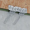 MASOZ installs on the inside of the form board (outside of wall), allowing panels to be placed without aligning sill plate holes with protruding anchor bolts.