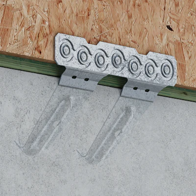 MASOZ installs on the inside of the form board (outside of wall), allowing panels to be placed without aligning sill plate holes with protruding anchor bolts.