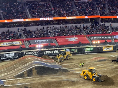 The Dirt Squad uses JCB earthmoving equipment to reshape the track for the freestyle event.