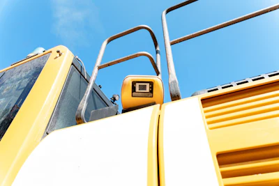 Advanced safety features such as backup cameras, improved lighting, and collision avoidance systems can protect drivers and reduce accident rates, especially on a busy jobsite.