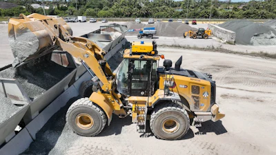 Ajax Paving’s Caterpillar 966XE wheel loader operated with Teleo technology loads their asphalt plant.