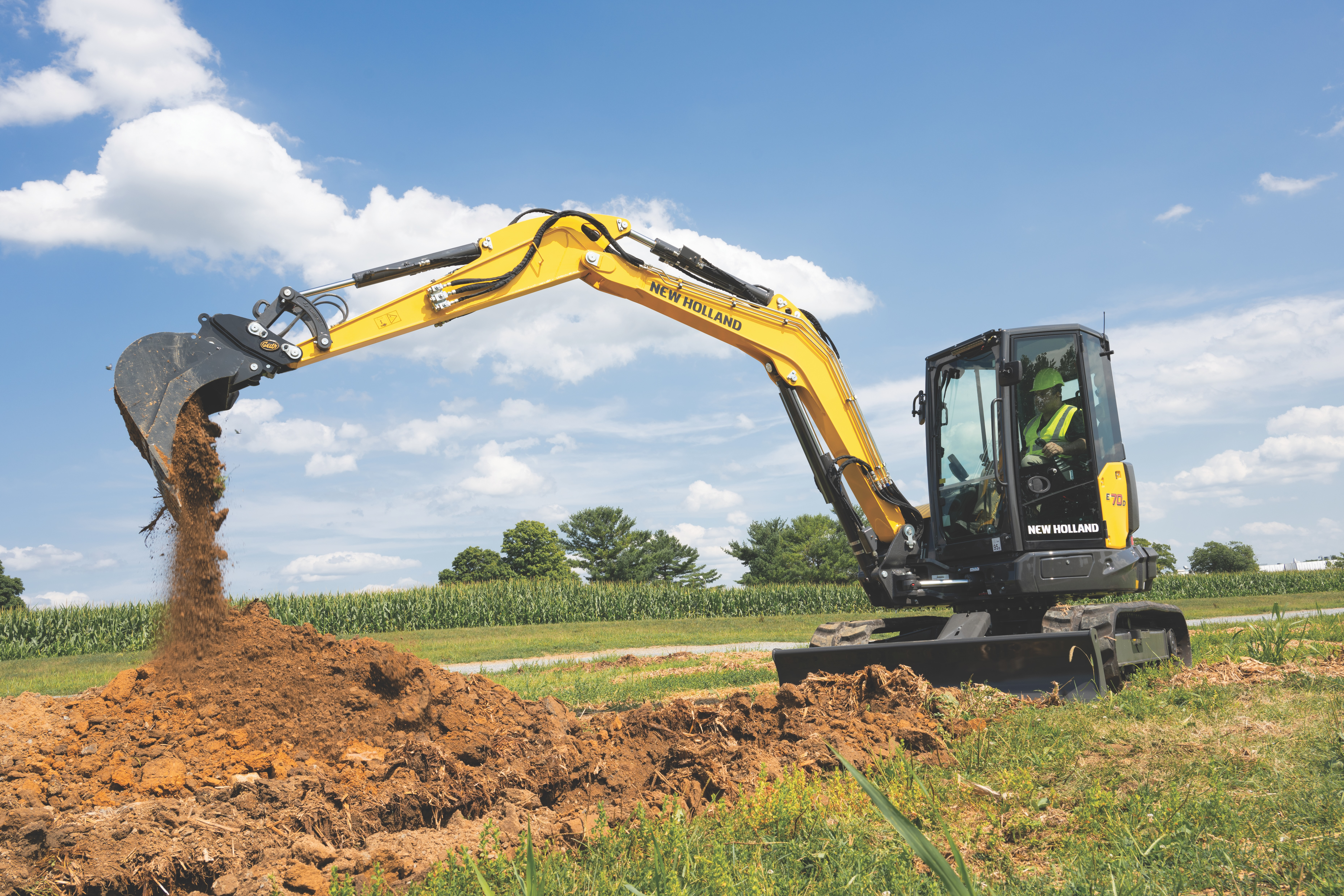 Designed for small- to medium-sized construction companies, landscapers, municipalities and farmers, the E70D can handle a variety of tasks — from digging and grading to material handling.