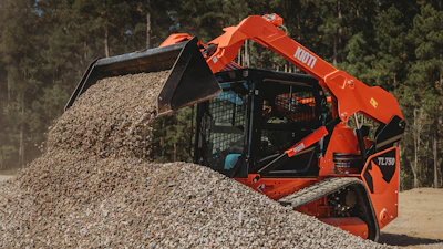Powered by a 74-hp diesel engine, the machine offers two-speed travel, pilot hydraulic joystick controls, rearview camera, sliding overhead door and LED work lights.