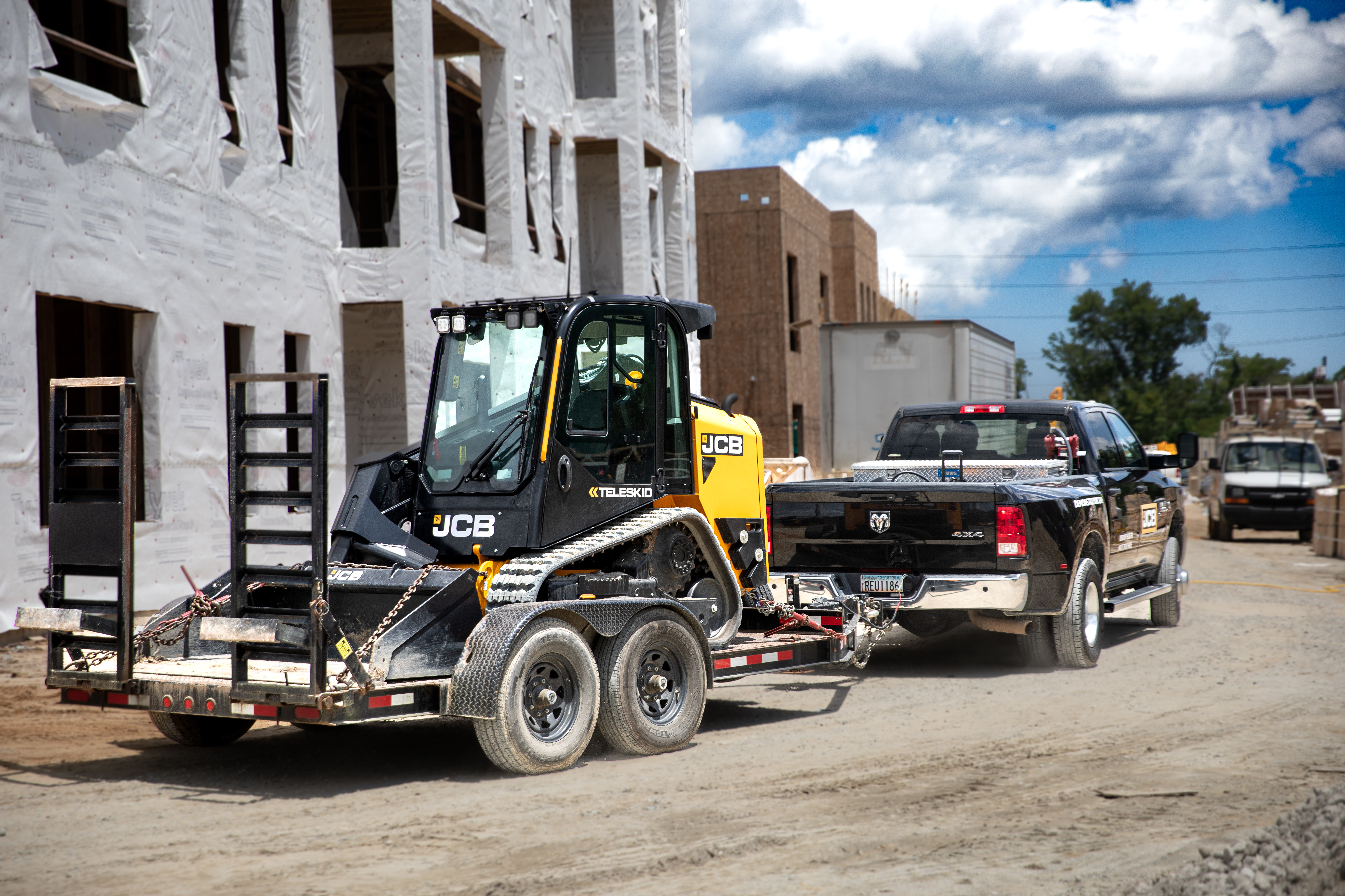 JCB's 3TS-8T Teleskid combines the versatility of a skid steer or compact track loader with the telescopic JCB Powerboom and SAE/ISO standard quick hitch.