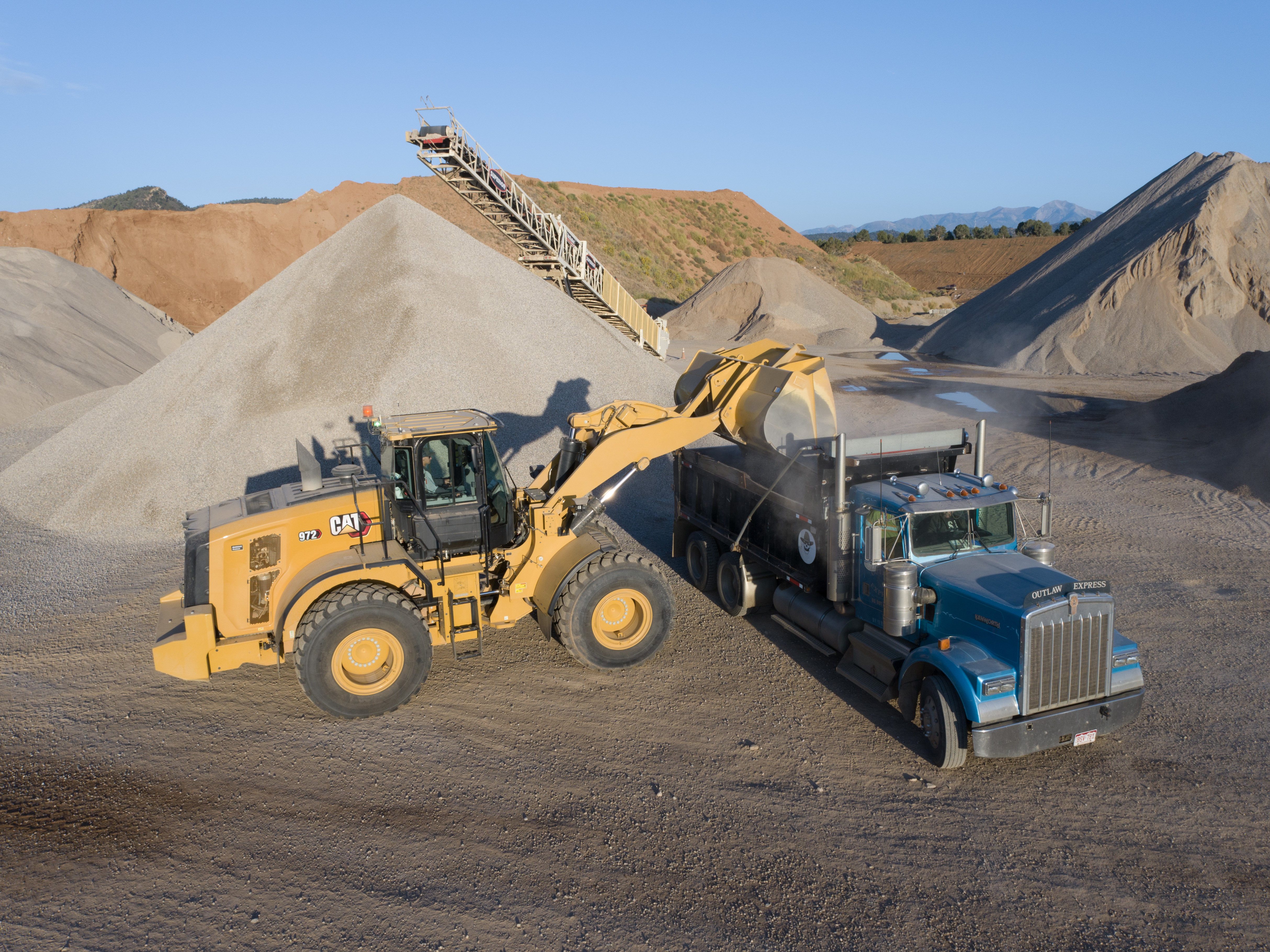 Weighing assistance on wheel loaders takes some of the guesswork out of loading. Using a wheel loader to fill a truck is made much easier by getting exact weights in each scoop.