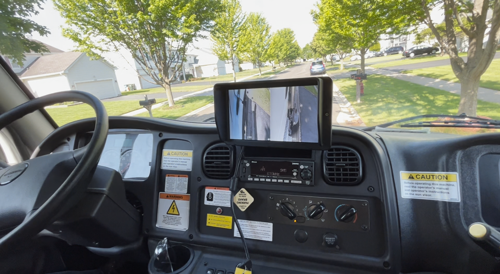The DualEyes Camera System supports visibility on the front right tire and front right corner of the sweeper in addition to the right-side broom.