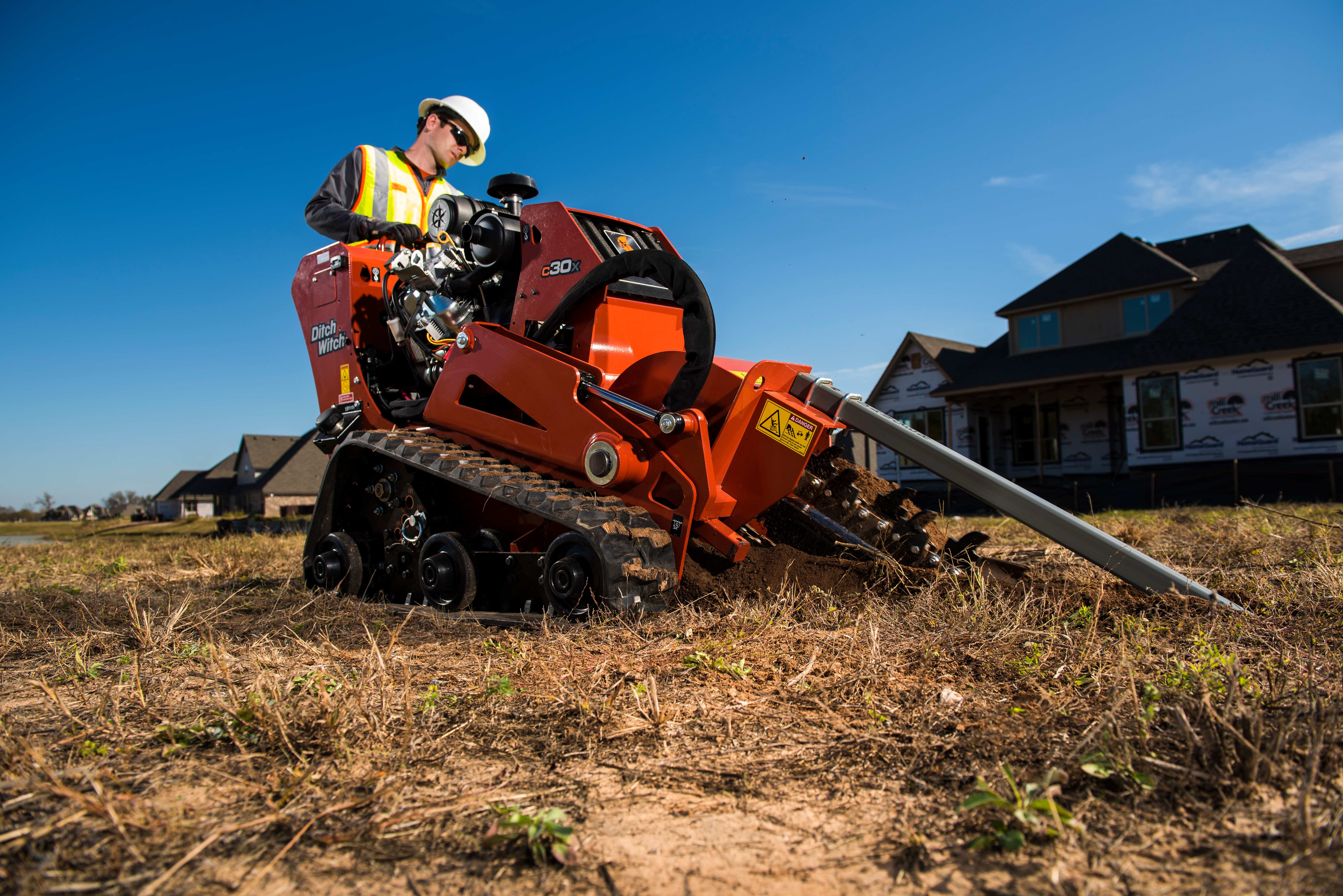 Walk-behind trenchers are more compact and maneuverable, perfect for smaller jobsites with tight spaces or numerous obstacles, such as residential lawns and backyards. Ditch Witch’s CX-series walk-behind trenchers, for example, are easier to transport and operate in confined areas, offering a practical solution for landscapers and contractors working on smaller-scale projects. Both types of trenchers are designed to meet specific needs, ensuring that operators can choose the best equipment for their particular job conditions. Pictured is the C30X.