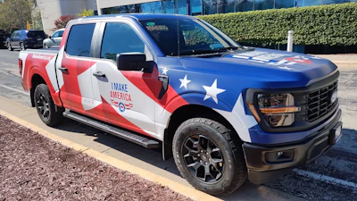 A Ford F-150 in a 'I Make America' wrap was onsite to draw attention to the competition. The winning model will not be wrapped.