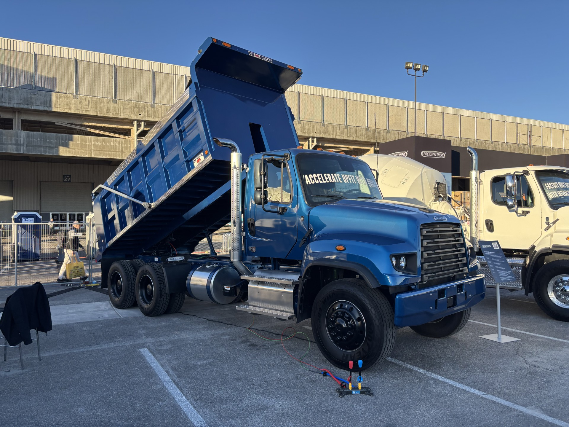 The Freightliner 114SD Ox Bodies Dump features a Detroit DT12 automated manual transmission and includes several key Detroit Assurance safety features.