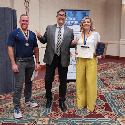 Brian (far left) received his Master’s in Social Work in 2024 from the University of Akron's online program.