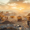 Mining excavators and trucks working in expansive open-pit quarry at golden sunrise