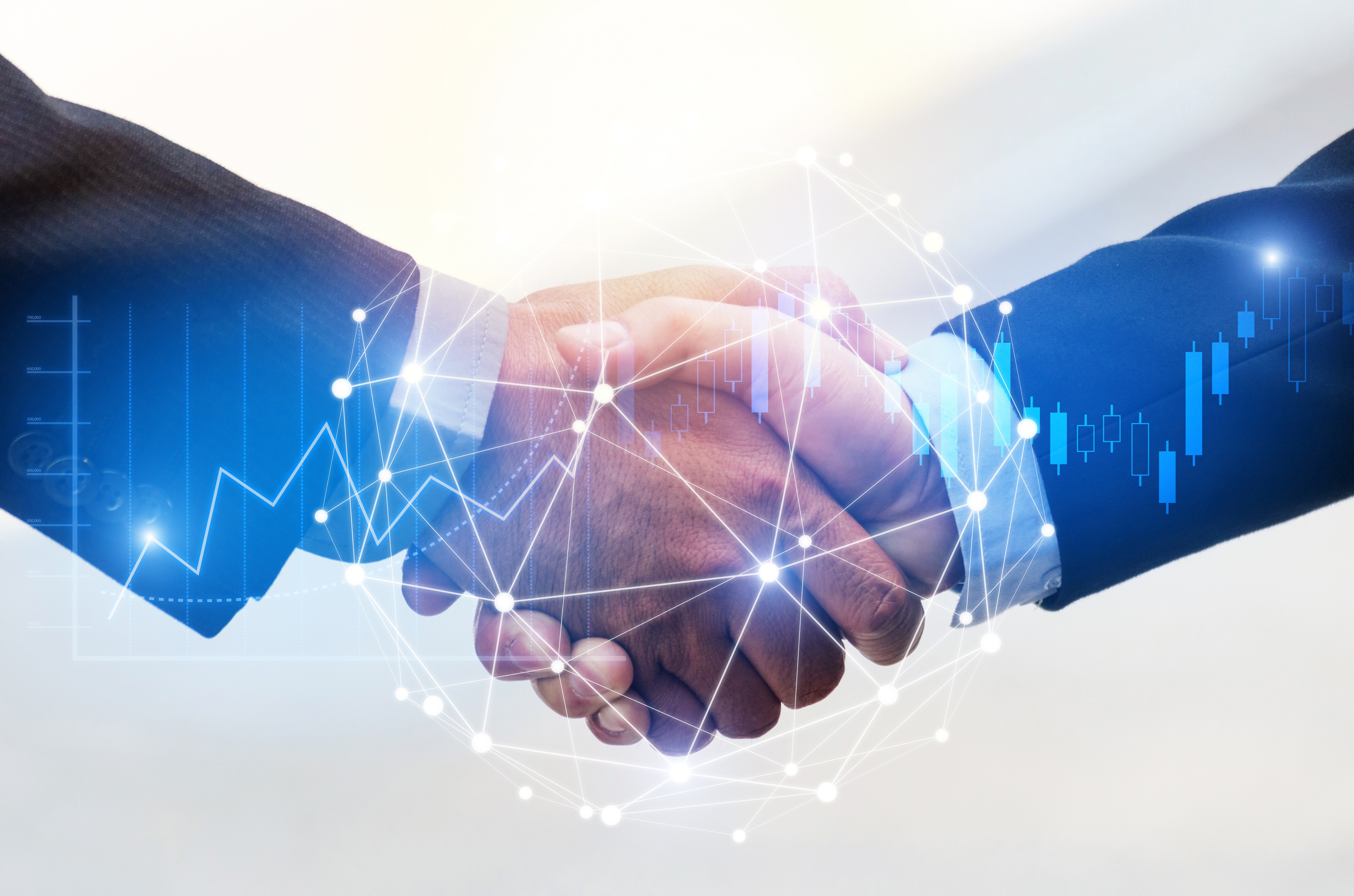 Digital business handshake with network connections and financial charts
