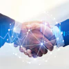 Digital business handshake with network connections and financial charts