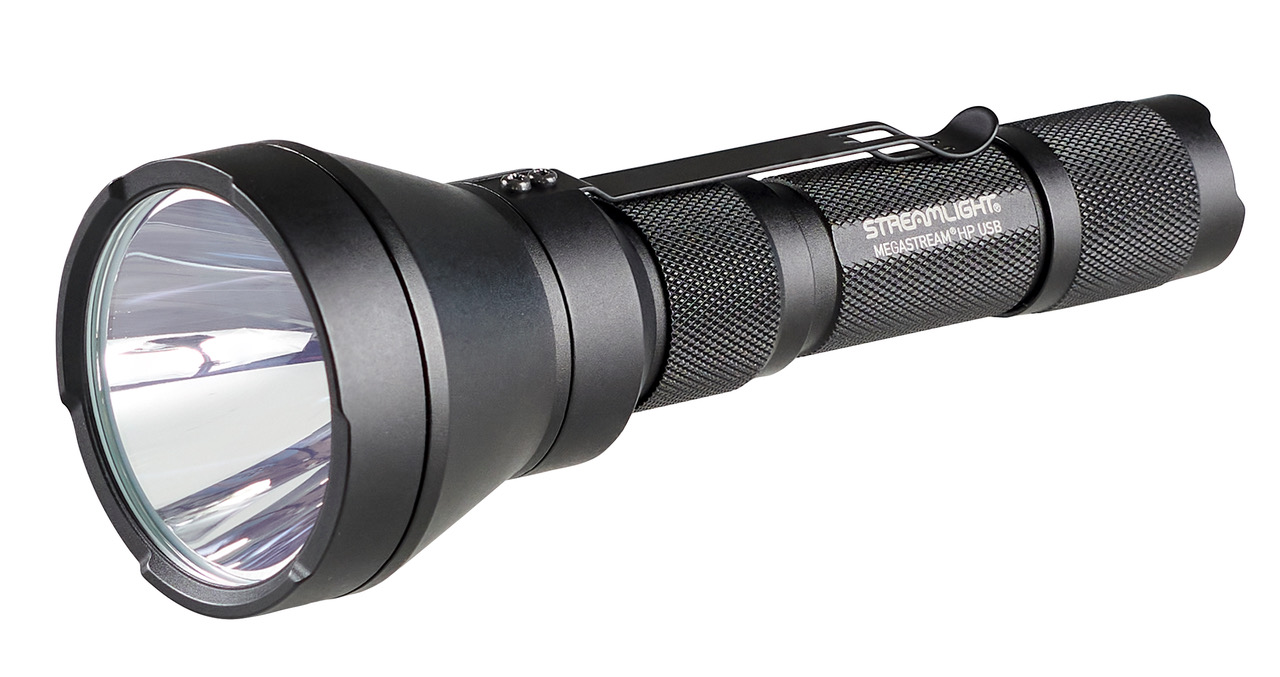 Streamlight tactical flashlight with large reflective lens and textured black metal body