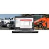 Diagnostic software laptop with commercial truck and Kubota machinery