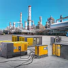 Industrial refinery with portable generators and processing equipment
