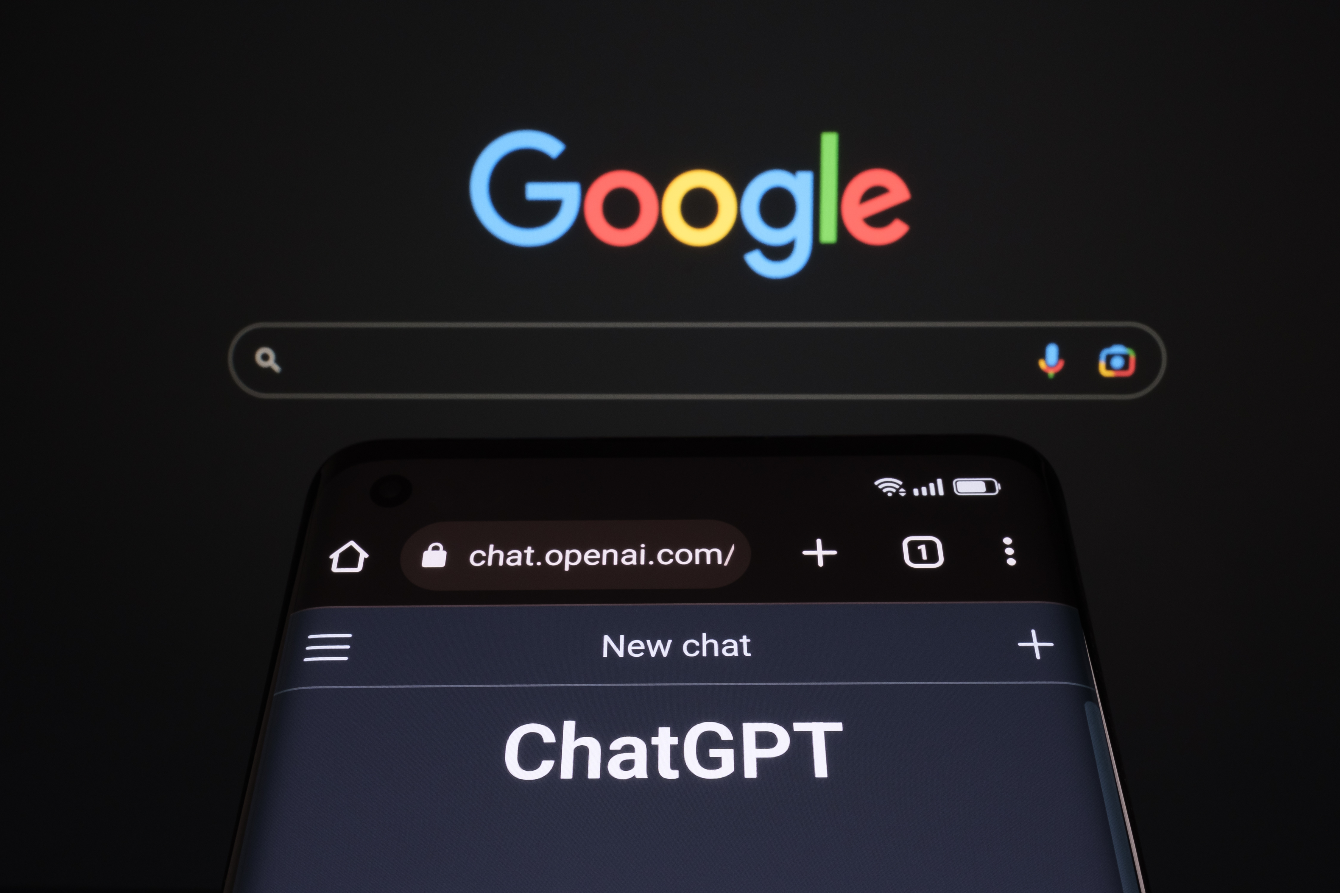 Google logo in colorful letters against dark background with search interface
