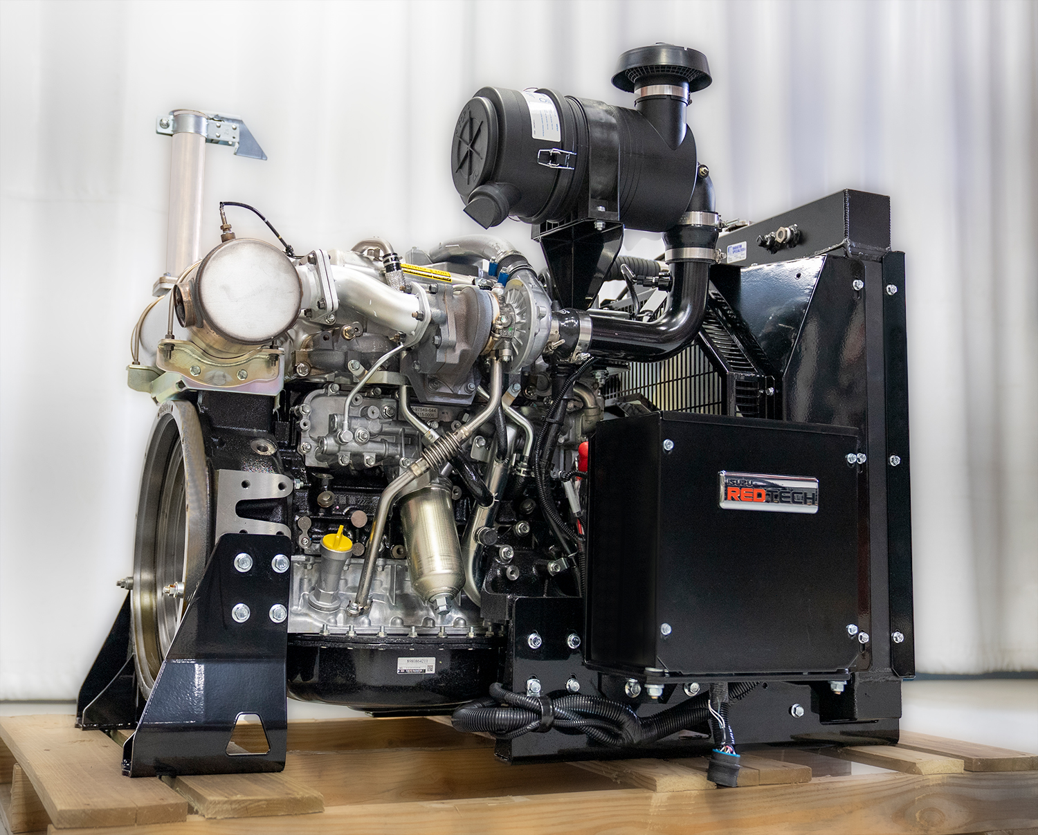Industrial diesel engine with complex mechanical components and RedSpec branding
