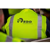 RDO Equipment Co. logo on bright safety vest with reflective stripes