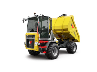 Yellow industrial dump truck with enclosed cabin on white background