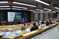 Corporate conference room with presentation about ASTEC Customer Tactics